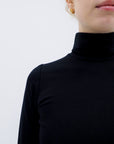 VICTORIA LOFTES 90’s turtleneck top