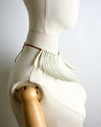 SASS AND BIDE 2011 "The flying Machine" tusk necklace.