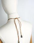 SASS AND BIDE 2011 "The flying Machine" tusk necklace.