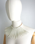 SASS AND BIDE 2011 "The flying Machine" tusk necklace.