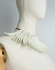 SASS AND BIDE 2011 "The flying Machine" tusk necklace.
